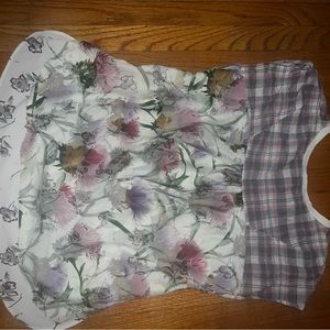 Very cute women shirt. Vintage style. Plaid with a floral print on back.